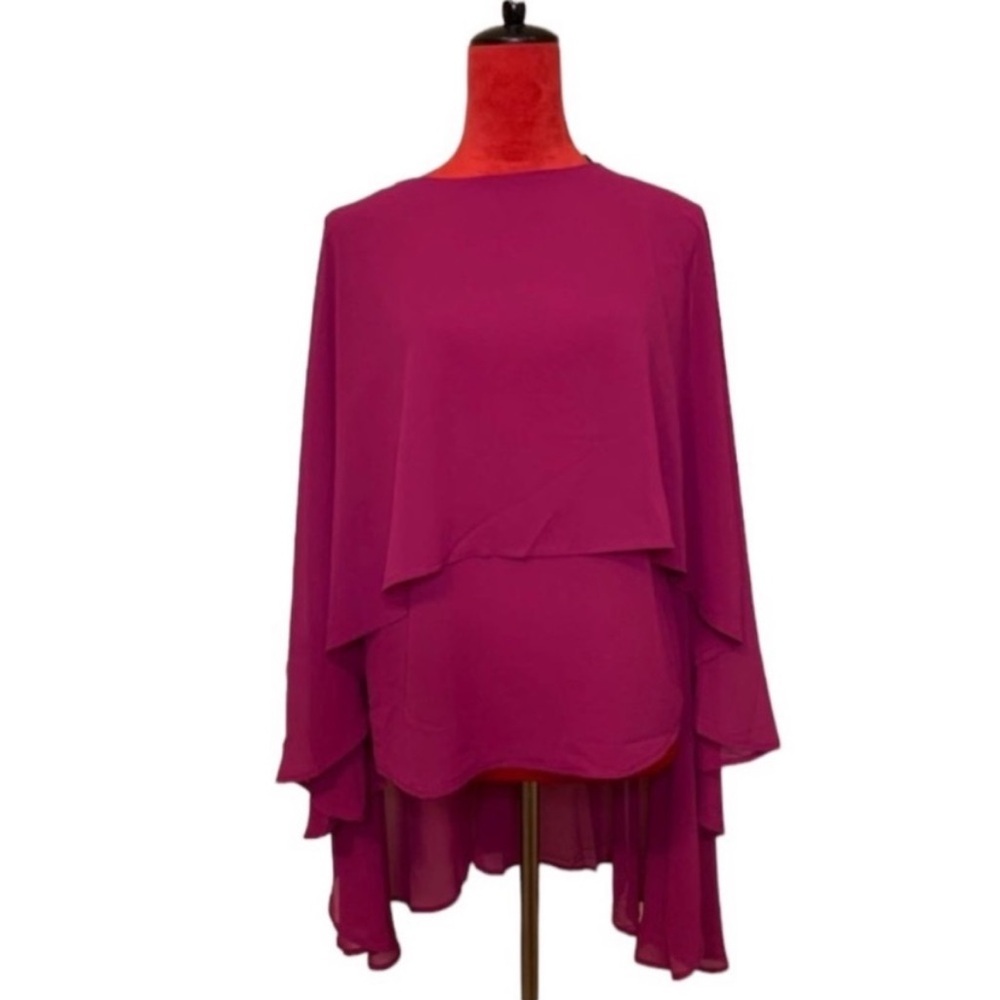 ASYMMETRICAL HEM TOP